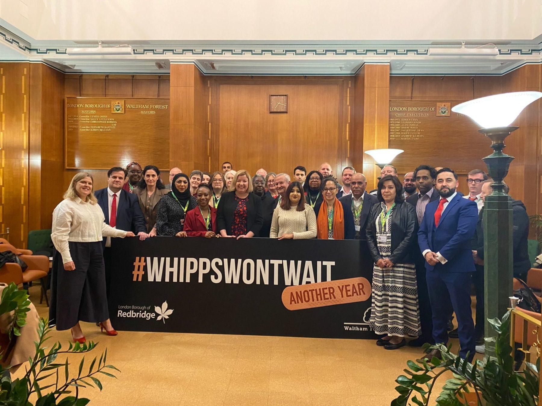 Labour Group councillors with #WhippsWontWait banner